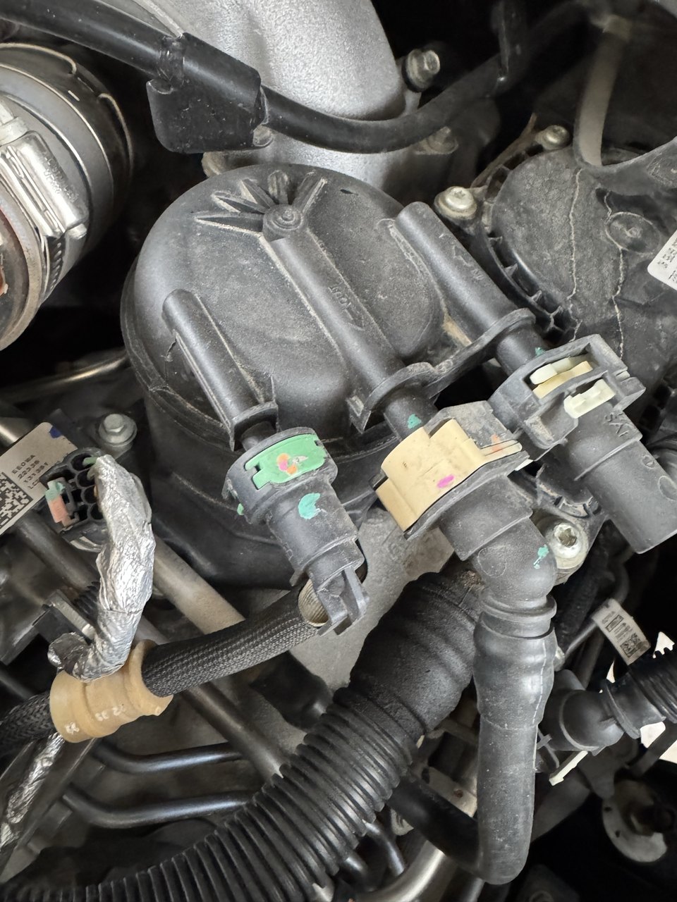 Actual Ford F-550 6.7L engine-mounted fuel filter housing photographed for KingKits fitment research