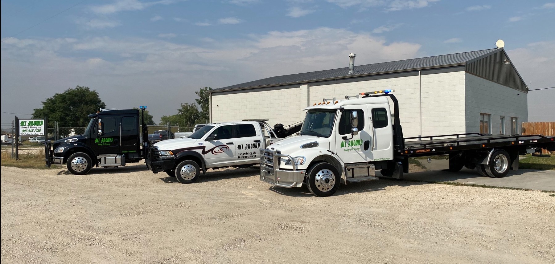 All Around Towing fleet lineup with working service trucks